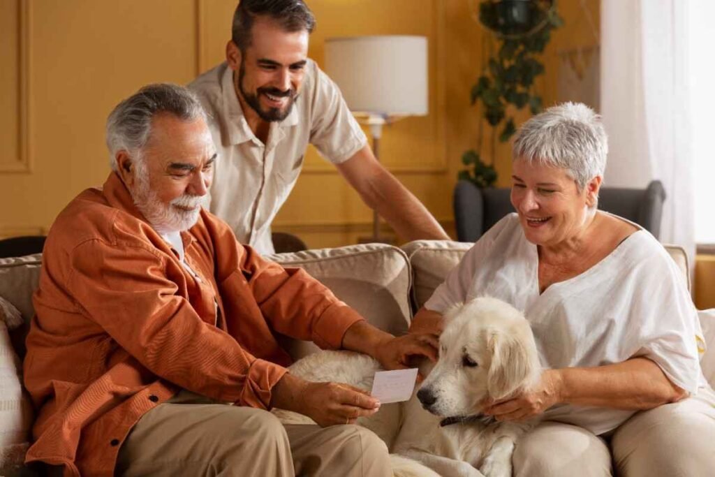 Senior couple enjoying time with their family and dog in an independent living space, highlighting companionship and joyful moments